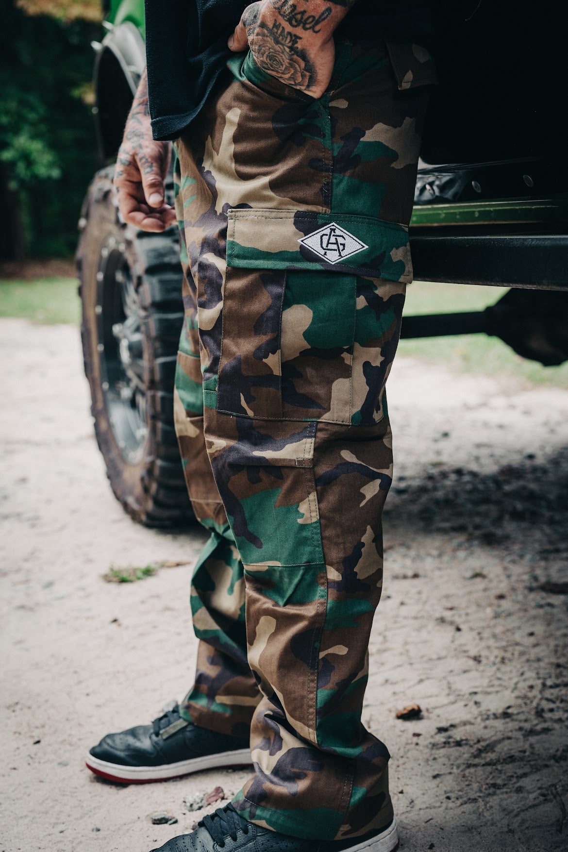 http://www.thegrindathletics.com/cdn/shop/files/the-grind-athletics-cargo-pants-woodland-camo-tactical-b-d-u-cargo-pants-33687008772193.jpg?v=1696526770