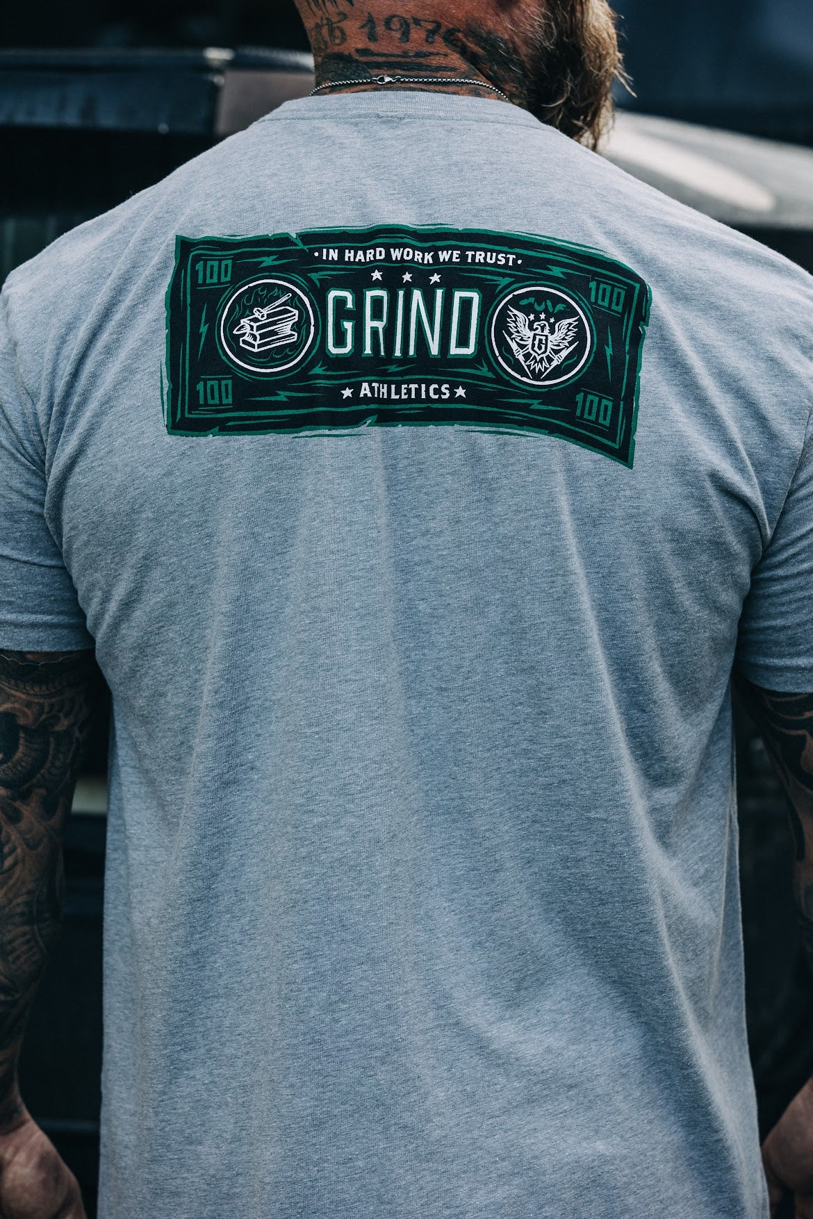 The Grind Athletics Graphic T-Shirt In GRIND We Trust