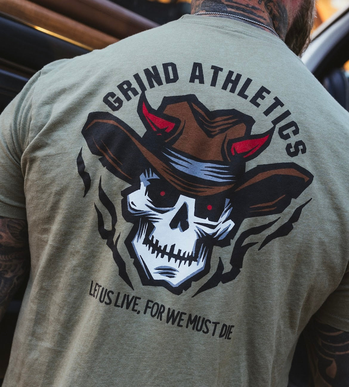 The Grind Athletics Graphic T-Shirt Let Us Live, For We Must Die