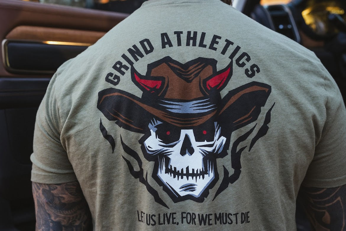 The Grind Athletics Graphic T-Shirt S / Light Olive Let Us Live, For We Must Die