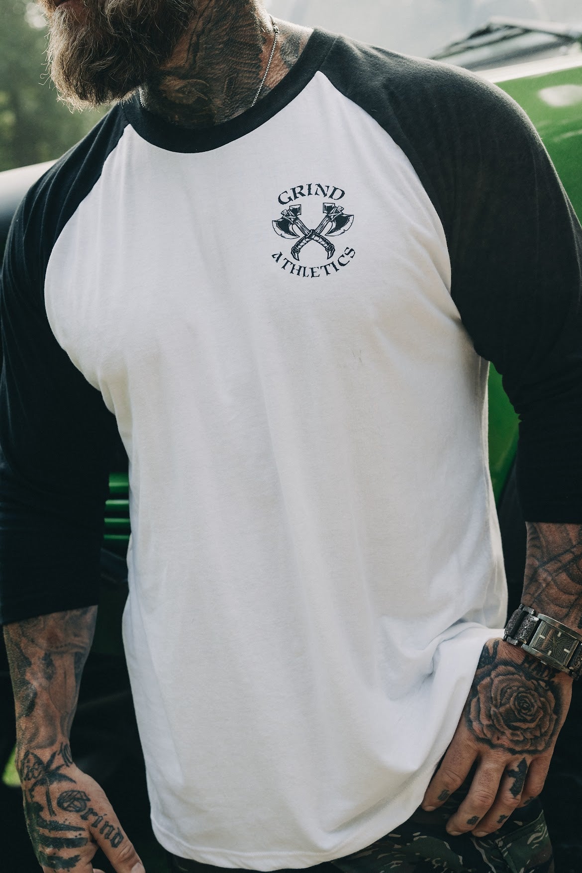 The Grind Athletics Sweat More In Training Bleed Less In Battle - Baseball Tee