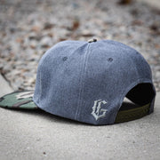 The Grind Athletics Camo and Gray "G" Snapback Hat