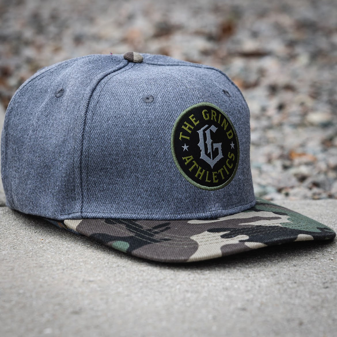 The Grind Athletics Camo and Gray "G" Snapback Hat