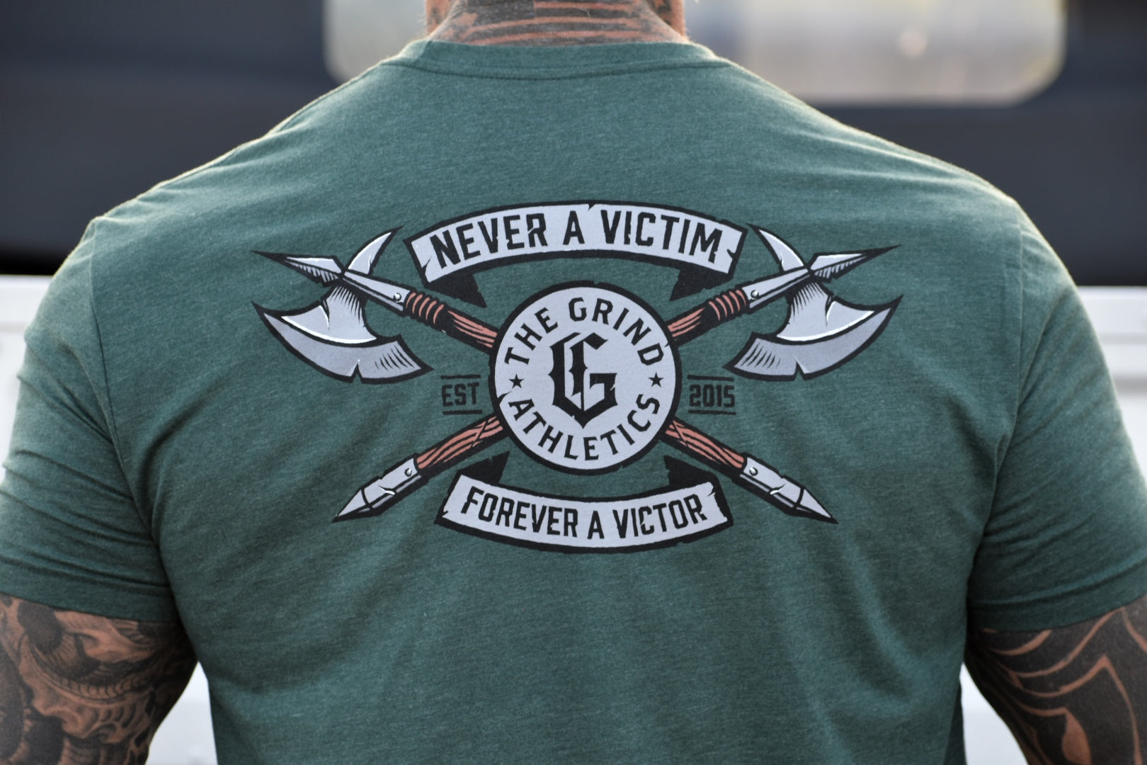 The Grind Athletics Never a Victim - Forever a Victor